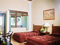 deluxe room at kuta puri bungalow